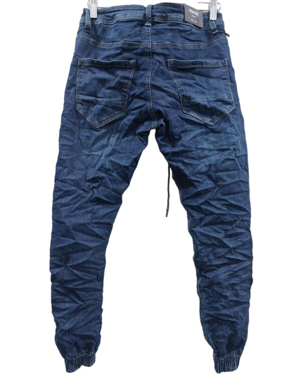 JEANS WITH A LACE AT THE WAIST